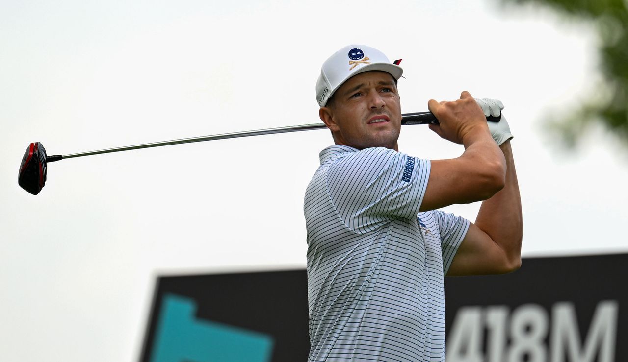 Bryson DeChambeau watches his tee shot