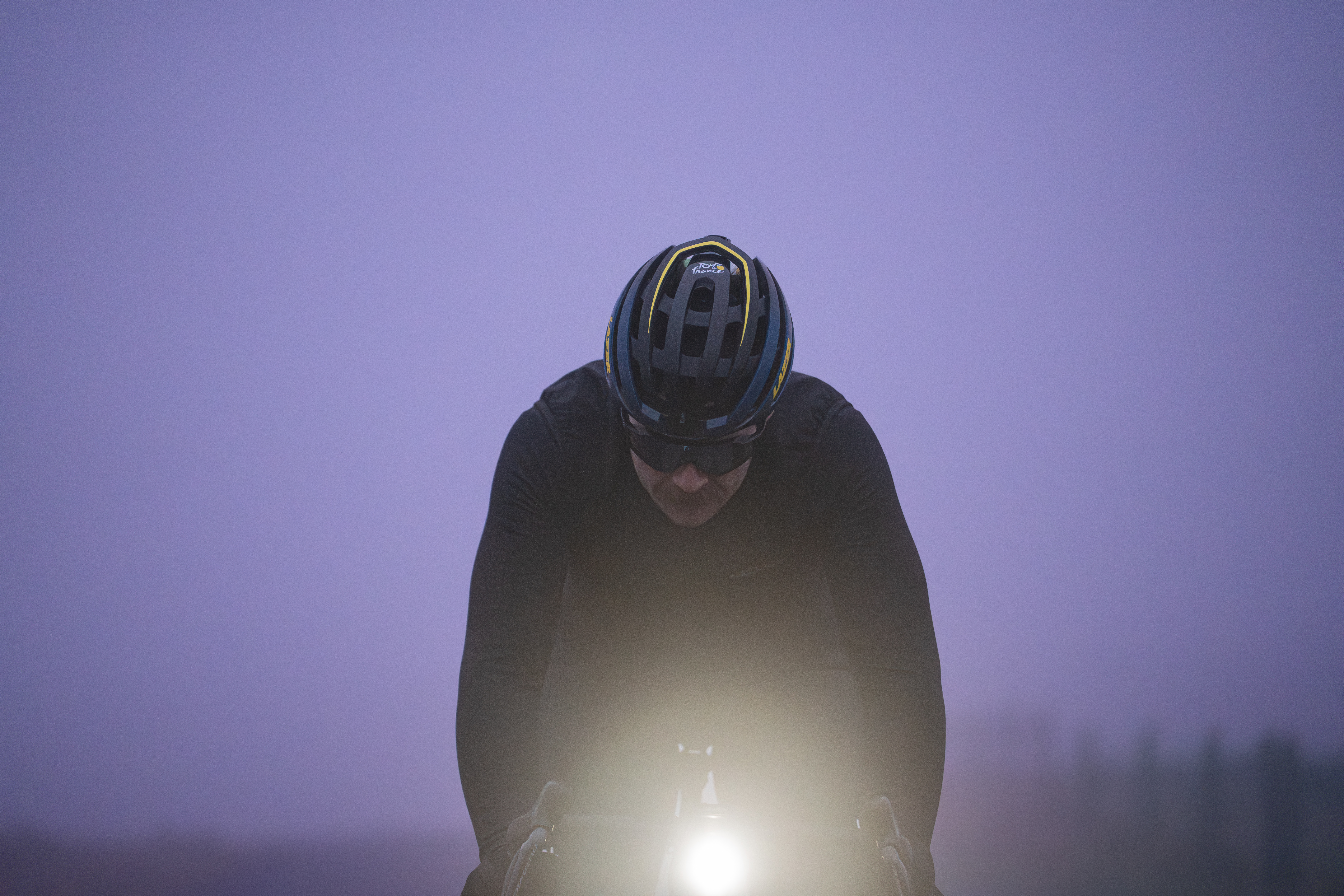 Man on bike at night