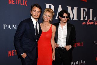 Pamela Anderson posing with her sons Brandan and Dylan at the premiere of her Netflix documentary in February 2023.