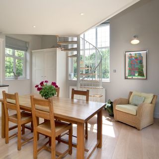 dining area with wooden flooring and wooden dining table