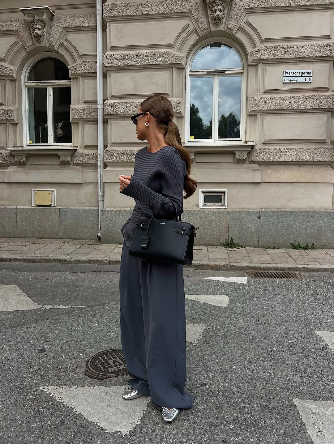 woman wearing winter ballet flat outfit 2025