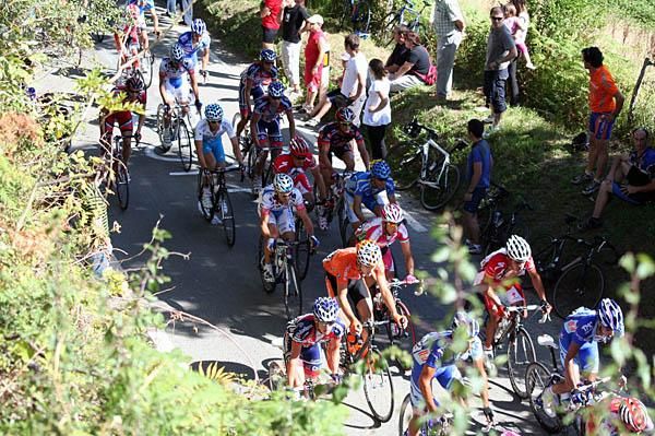 The peloton climbs as the race begins to wind up.