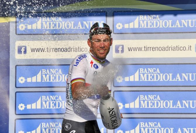 Stage 6 winner Mark Cavendish (Omega Pharma-QuickStep) lets loose with the champagne