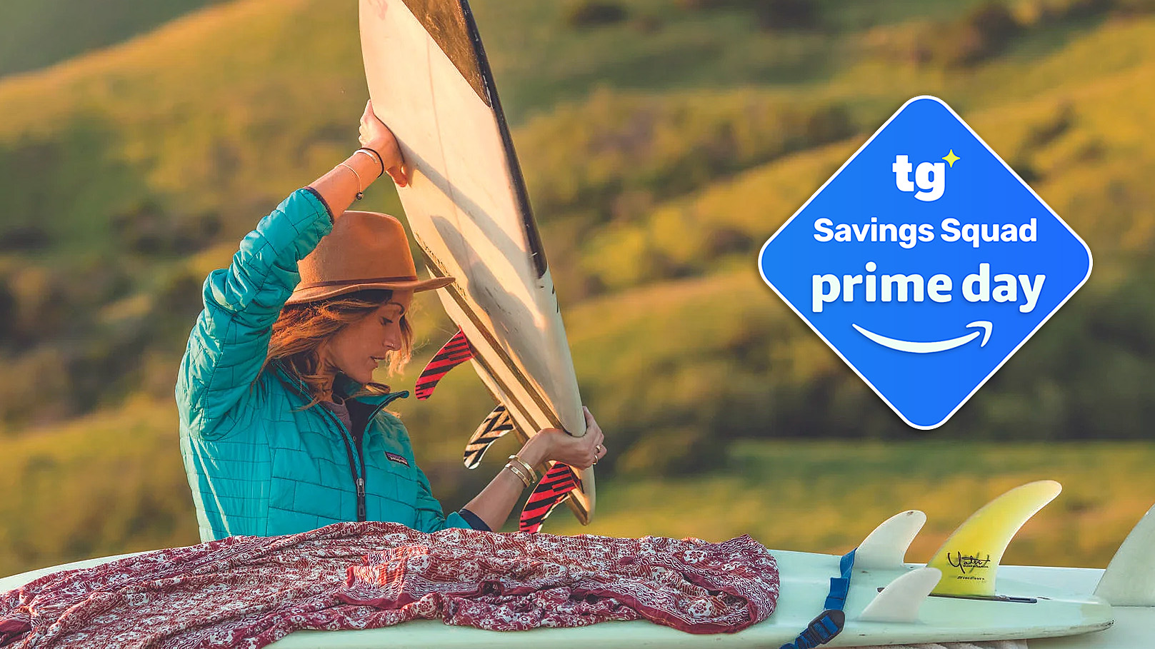A women wearing a Patagonia Nano Puff insulated jacket lifts a surfboard in the early morning light
