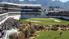 A golfer tees off at the 16th hole at the WM Phoenix Open