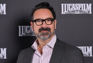 James Mangold in front of Lucasfilm Ltd logos