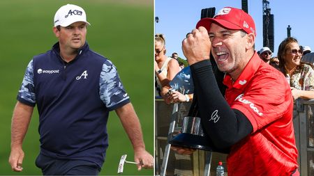 Patrick Reed walks on the green, whilst Sergio Garcia fist pumps