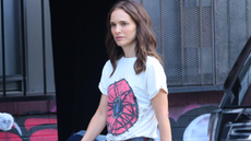 Natalie Portman wearing burgundy flares and graphic t-shirt