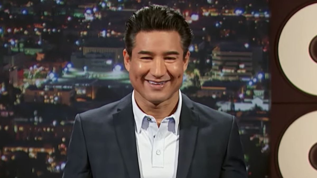 Mario Lopez smiling hosting Blank Slate