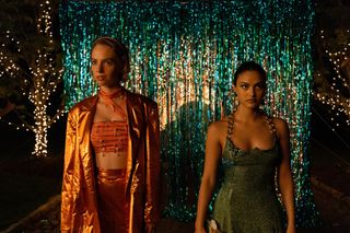 Maya Hawke as Eleanor and Camila Mendes as Drea wearing sparkly dresses