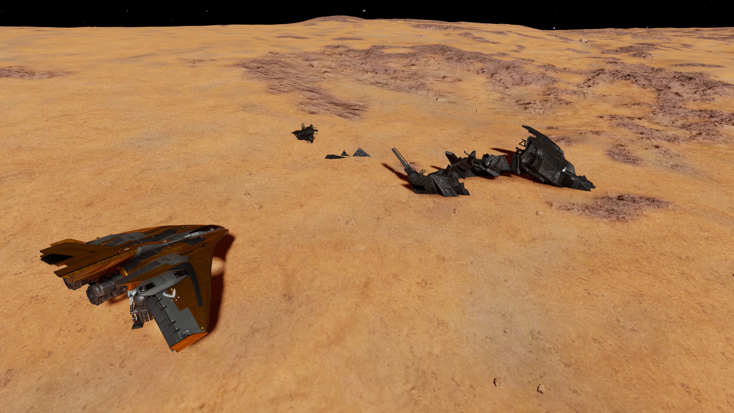 A spaceship sits on a barren planet near the wreckage of another ship.