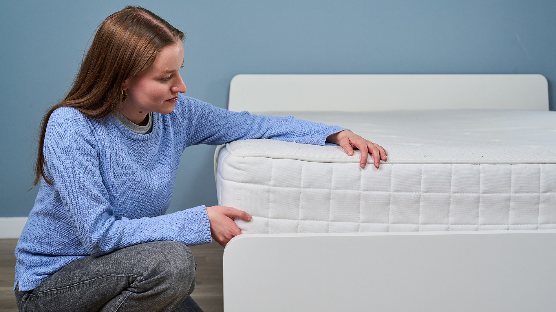Mattress tester Frances Daniels checks the integrity and comfort of a mattress