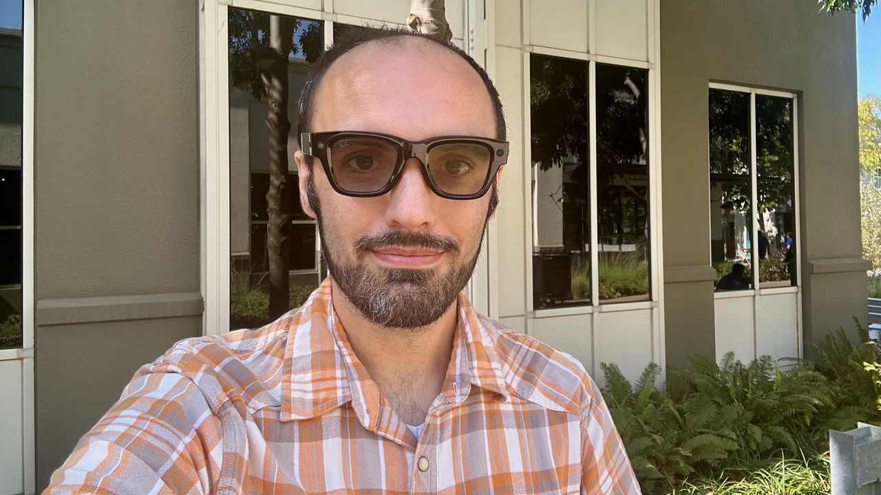 A selfie of the author wearing the Meta Ray-Ban Display glasses with transition lenses.