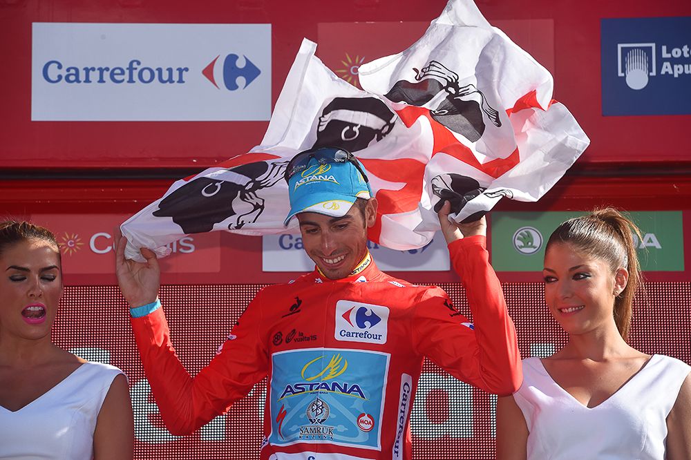 Fabio Aru celebrates on the stage 20 podium.