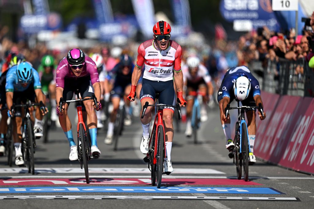 NAPLES ITALY MAY 11 Mads Pedersen of Denmark and Team Trek Segafredo celebrates at finish line as stage winner ahead of LR Jonathan Milan of Italy and Team Bahrain Victorious Purple Points Jersey and Fernando Gaviria of Colombia and Movistar Team during the 106th Giro dItalia 2023 Stage 6 a 162km stage from Naples to Naples UCIWT on May 11 2023 in Naples Italy Photo by Stuart FranklinGetty Images