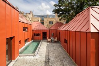 red self build with courtyard garden swimming pool