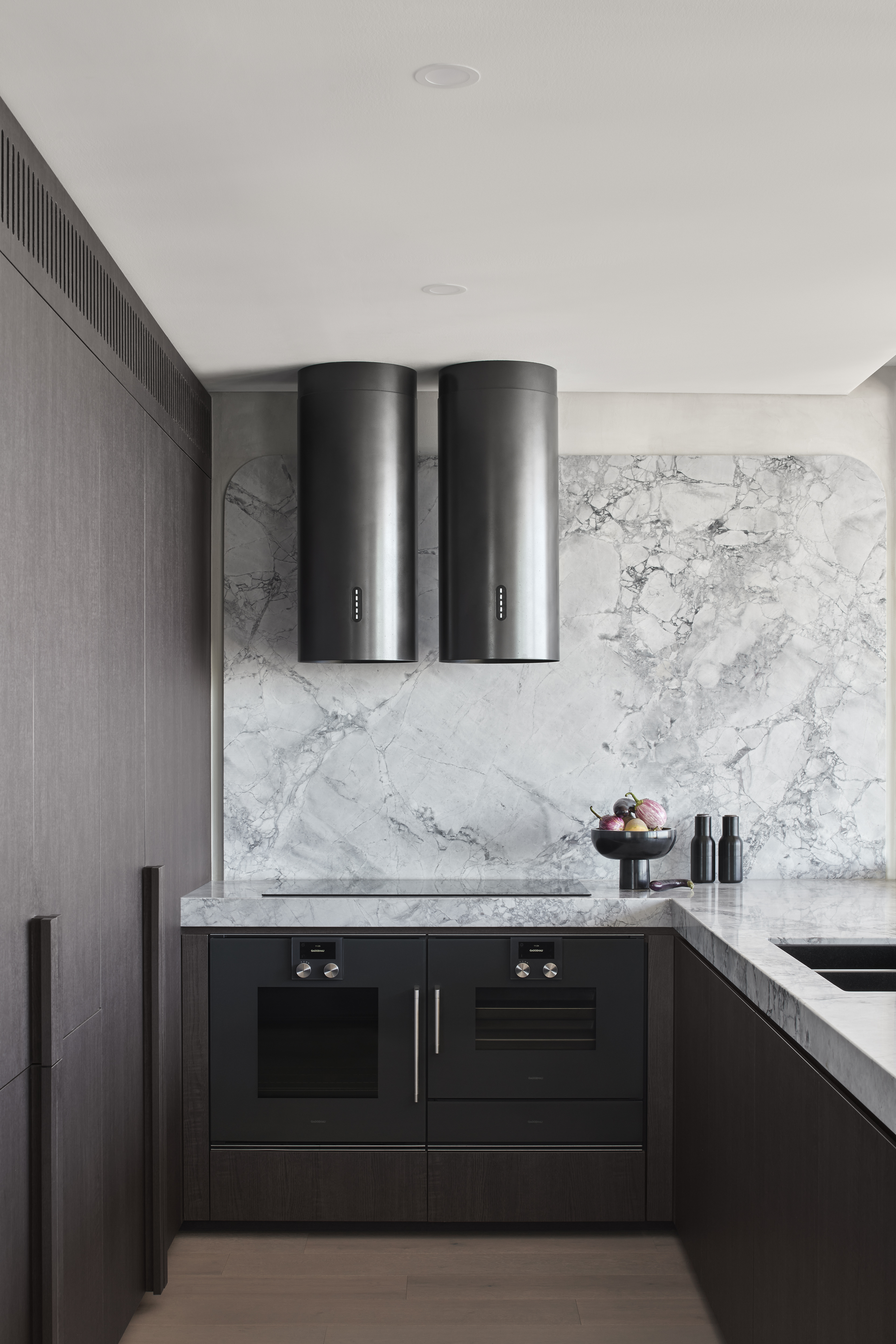 A kitchen with a large, singular cabinet