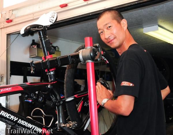Bassman, who some think may be the best bike mechanic in the world, prepares Marie-Helene Premont's race machine.