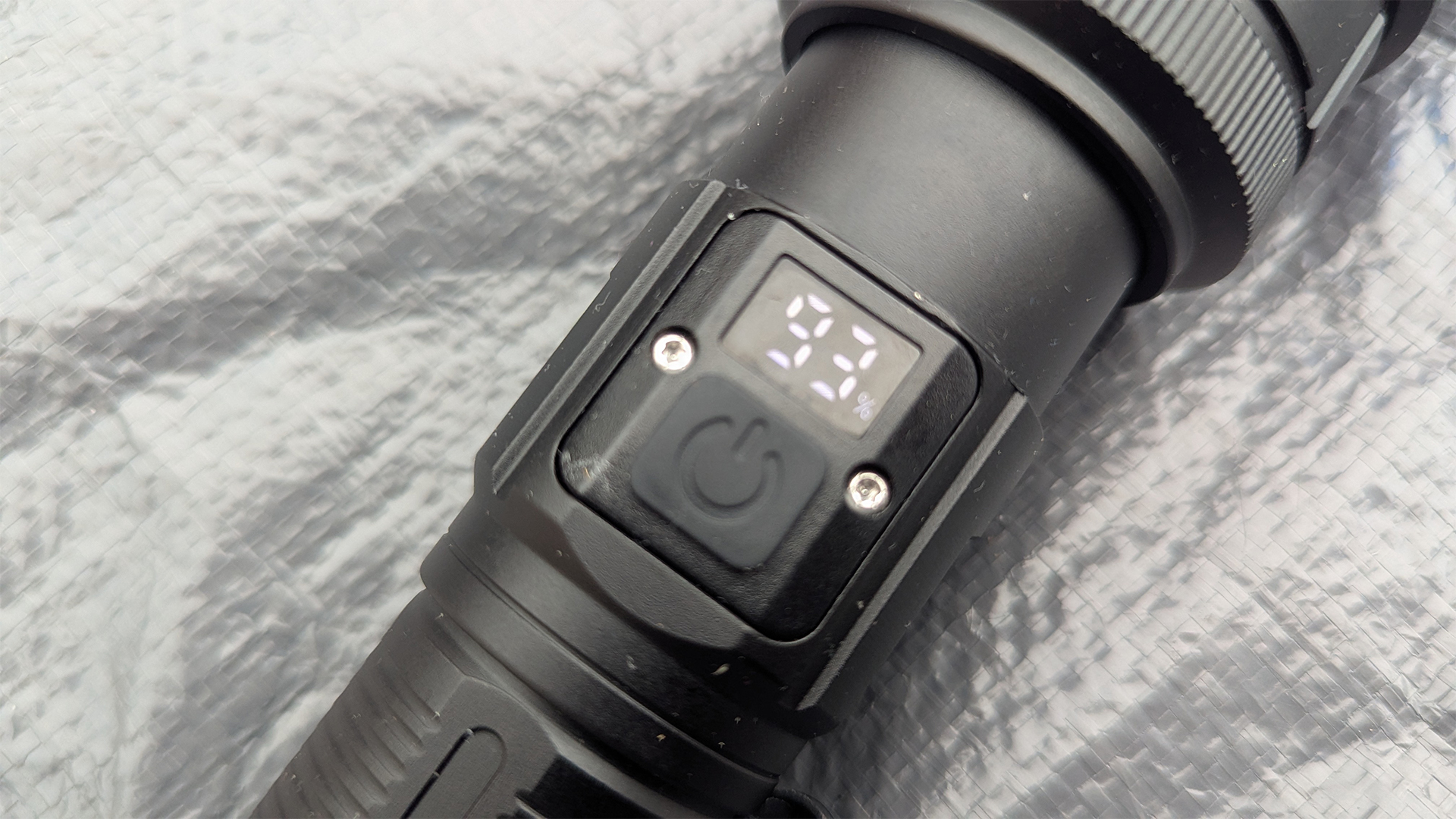 The Windfire Flashlight during review with the LCD indicator showing that 93% battery remains.
