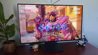 LG UltraGear 32GS95UE-B with Overwatch 2 character select on screen and Pharah selected