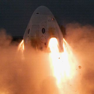 SpaceX test-fired the eight SuperDraco launch abort engines on its Crew Dragon spacecraft in a successful ground test on a pad at the Cape Canaveral Air Force Station in Florida on Nov. 13, 2019. The system is designed to keep astronauts safe in a launch emergency.