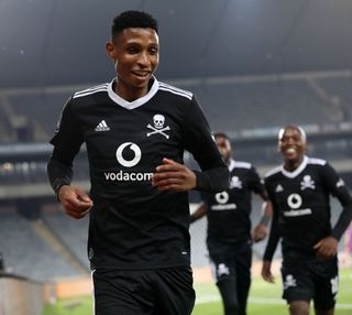 Vincent Pule of Orlando Pirates celebrates his goal with teammate