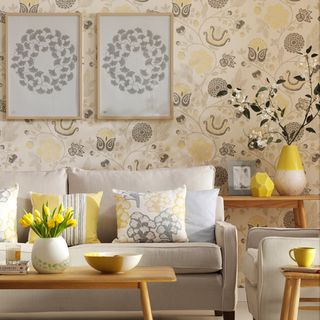 yellow floral living room with sofa cushions and coffee table