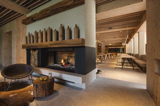 cosy interiors and lots of timber create a warm atmosphere in this hotel in Slovenia
