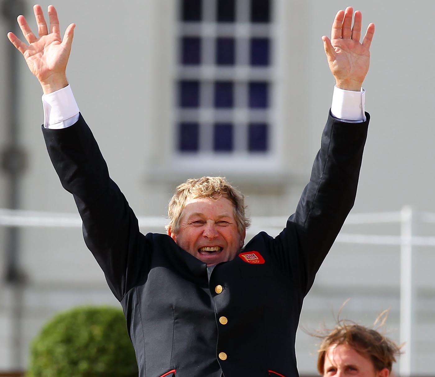Team gold medallist Nick Skelton celebrates before the medal ceremony at London 2012 Olympic Games.