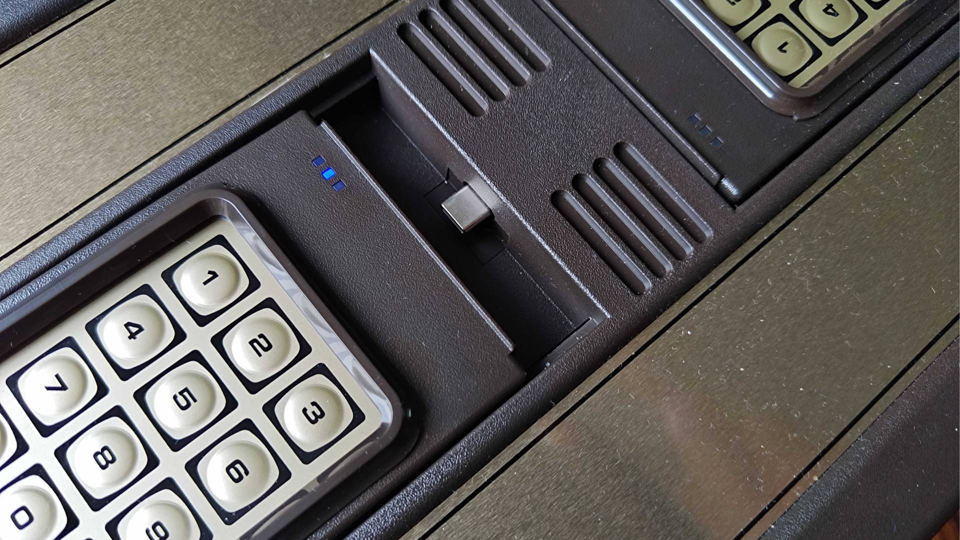 Close up of Intellivision Sprint controller dock with USB-C connector in view.