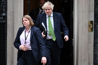 Boris Johnson leaving Downing Street after an emergency COBRA meeting in February 2022