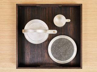 The tea set, made from hand-polished