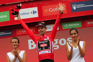 Tom Dumoulin on the podium after winning the Stage 17 Time Trial and taking the leader's jersey of the 2015 Vuelta Espana