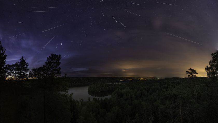 A long exposure photo of meteors in the night sky