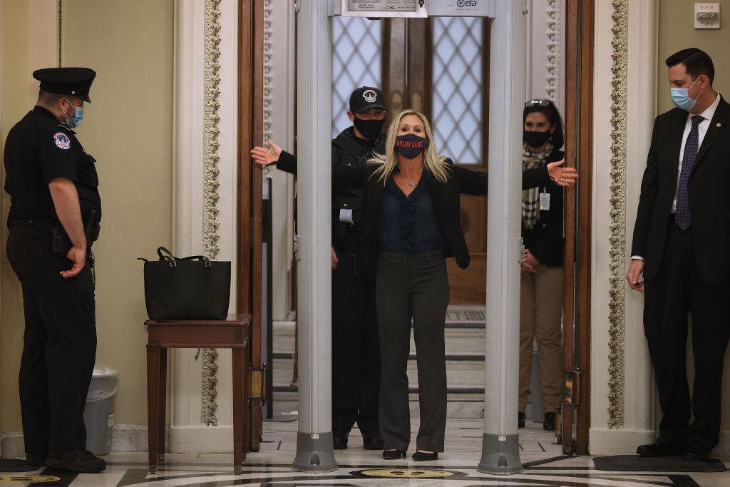 Rep. Marjorie Taylor Greene goes through the Capitol&amp;#039;s new metal detector.