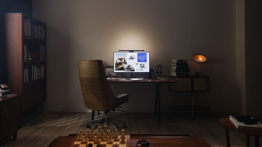 A computer desktop lit by a BenQ ScreenBar Halo 2.