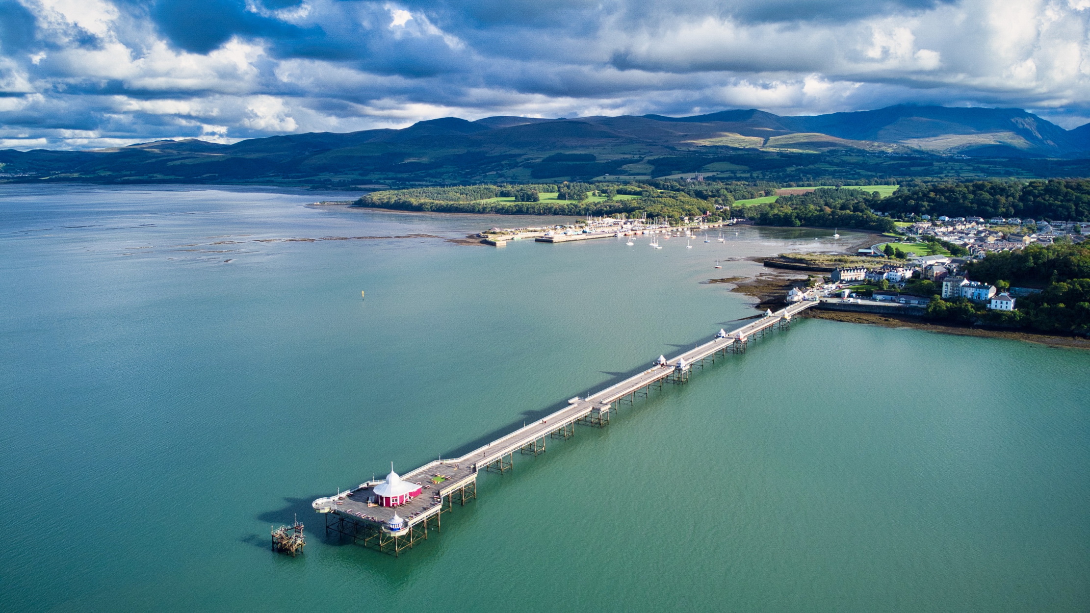 Garth Pier in Bangor stretching out into the Menai Strait, viewed from above.