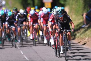 Peter Kennaugh puts in a stint on the front of the peloton