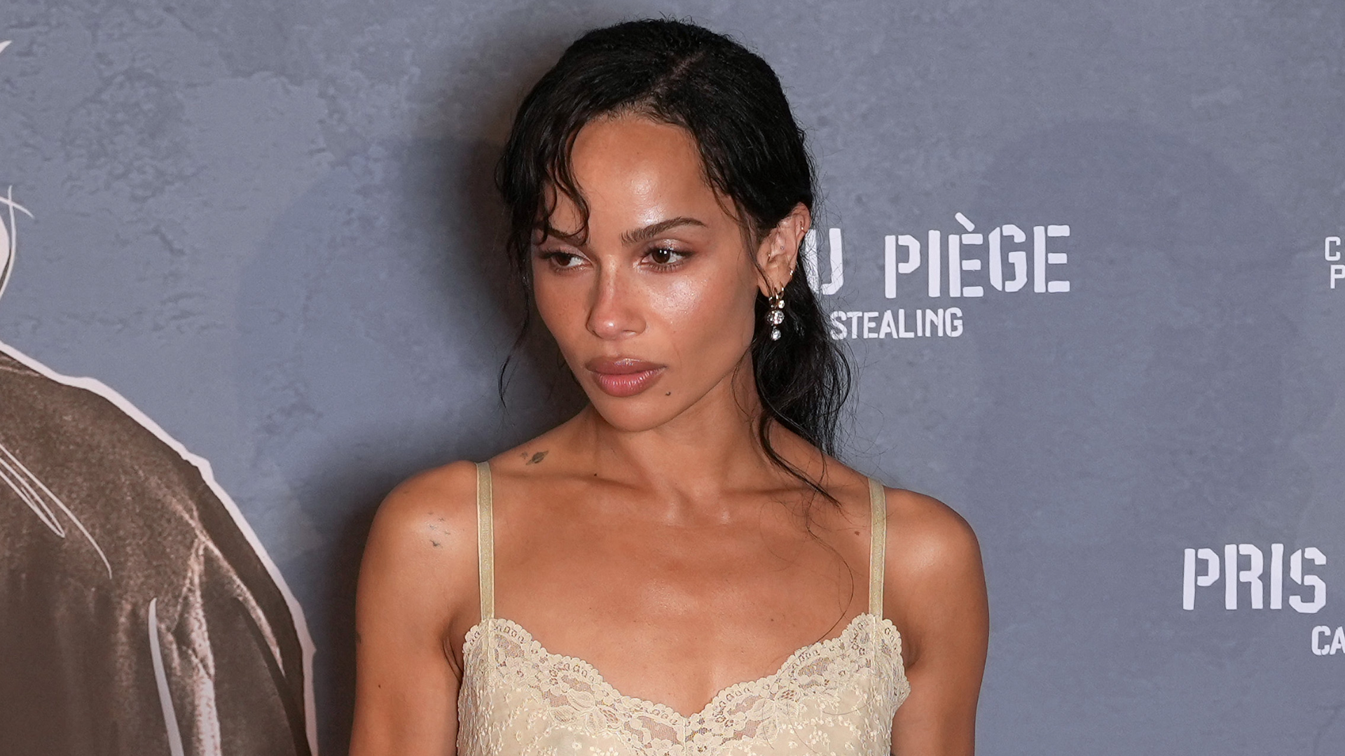 Zoë Kravitz walked the red carpet at the 'Caught Stealing' Paris premiere in a lace-trimmed lingerie slip dress