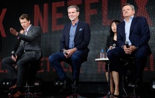 Netflix executives Greg Peters, Reed Hastings and Ted Sarandos