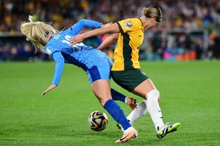 Kyra Lillee Cooney-Cross (R) of the Australia women soccer team and Chloe Maggie Kelly (L) of England women soccer team are seen during the FIFA Women's World Cup 2023 match between Australia and England.