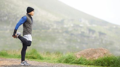 A runner stretches.