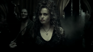 Bellatrix smiling with her wand in Harry Potter
