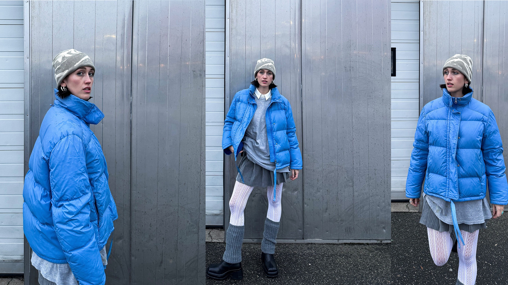 Leonie wears gray outfit and white tights with a blue puffer jacket over everything. 