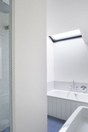 The bathroom with ceiling lights