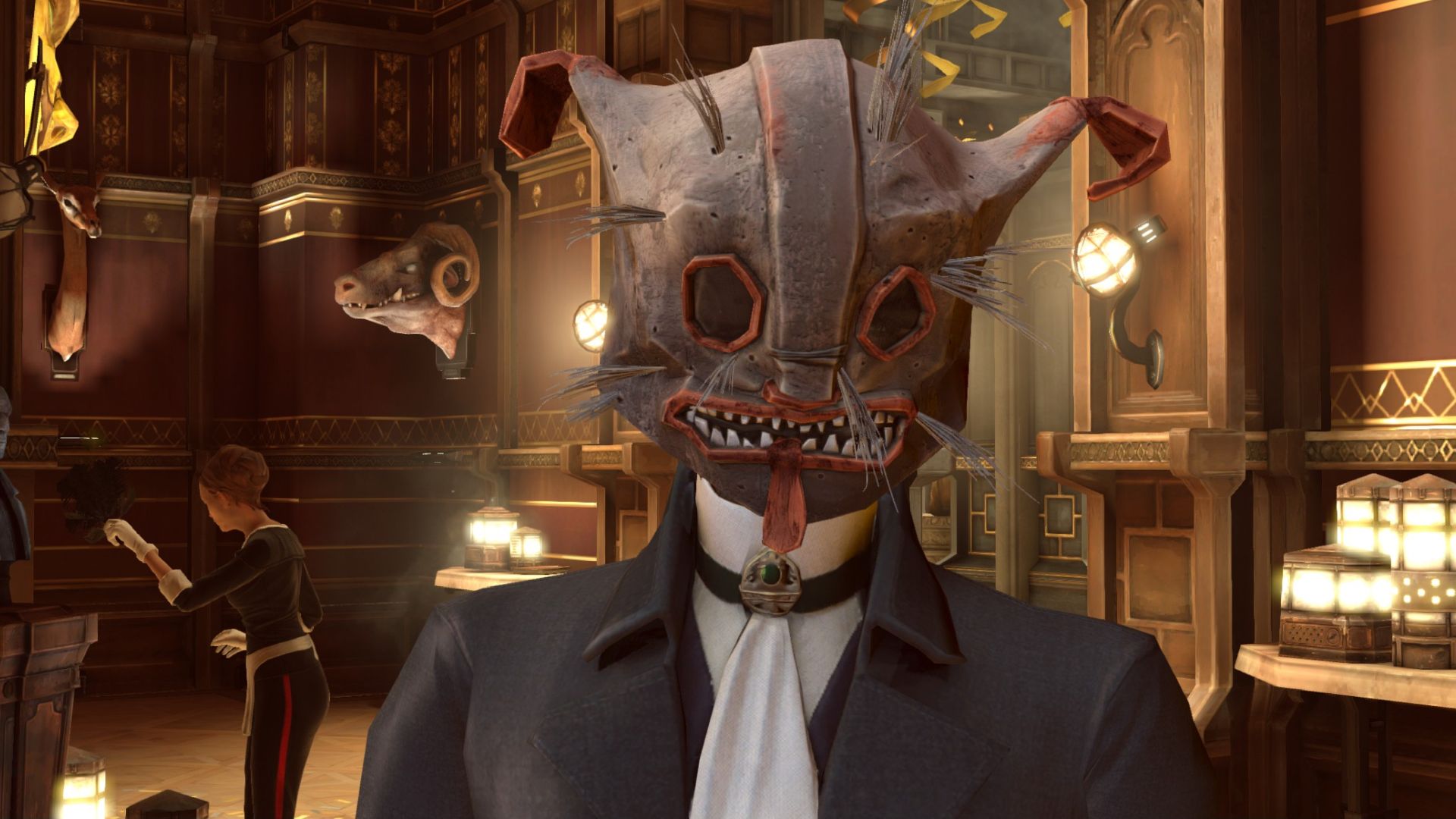 A well-dressed man in a twisted animal mask