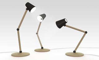 Three desk lamps with black shades