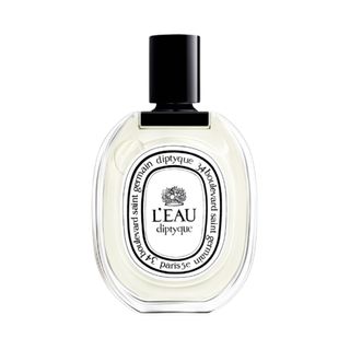 A product shot of the Diptyque L'Eau eau de toilette bottle on a white backgroung