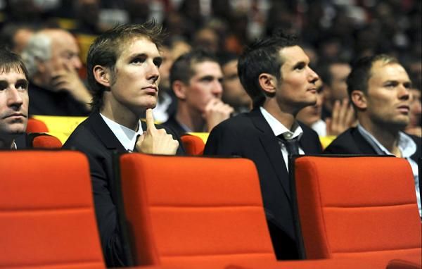 Andy Schleck and brother Frank watch as the 2011 Tour route is unveiled