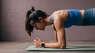 a photo of a woman doing a plank exercise